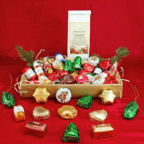 Geschenk-Idee Weihnachten: Bunter Teller mit duftenden Glühwein-Tee & edlen Winterpralinen
