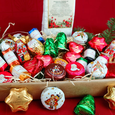 Geschenk-Idee Weihnachten: Bunter Teller mit duftenden Glühwein-Tee & edlen Winterpralinen